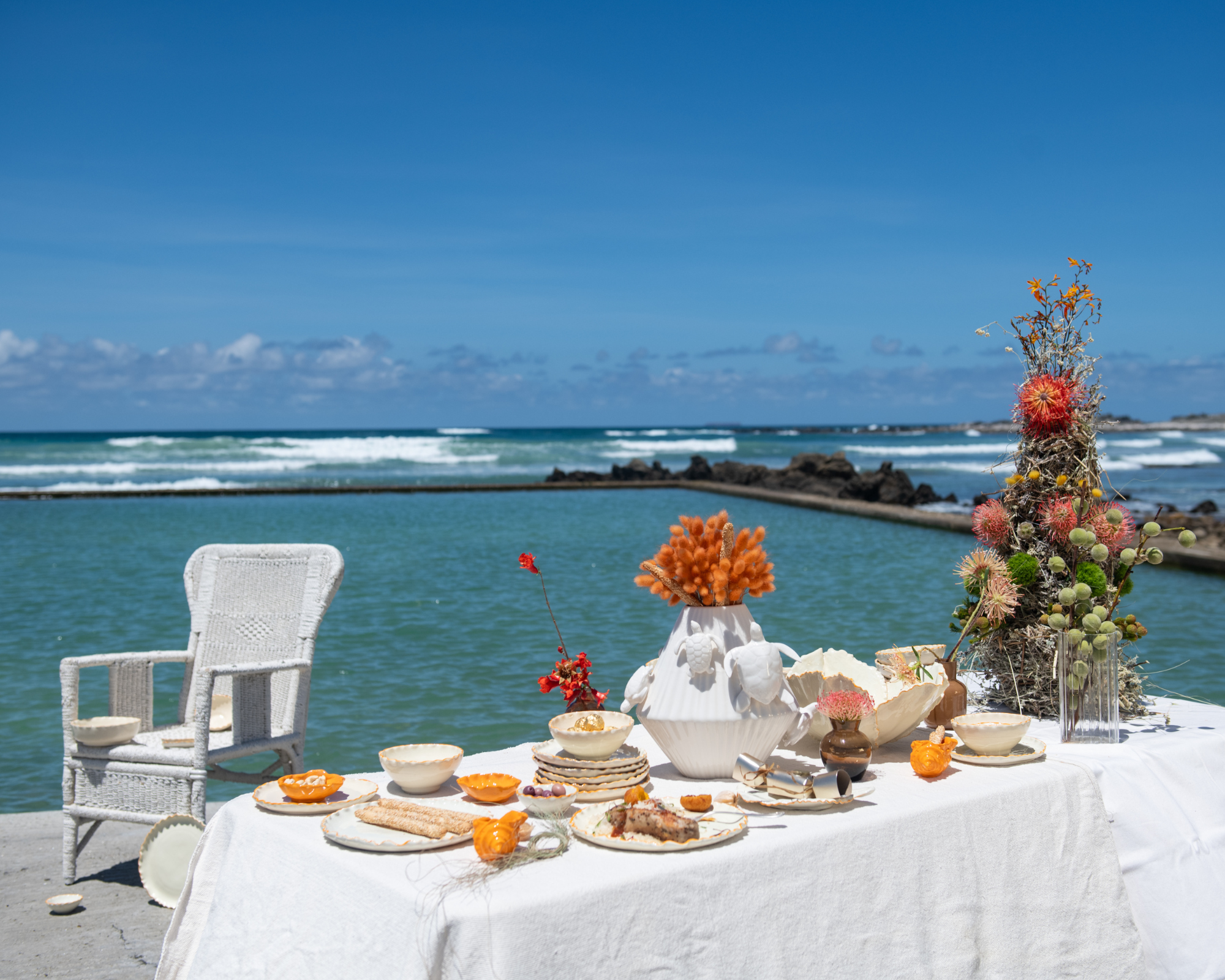 Rialheim handcrafted ceramic dinnerware collection styled on a summer table, South African stoneware.