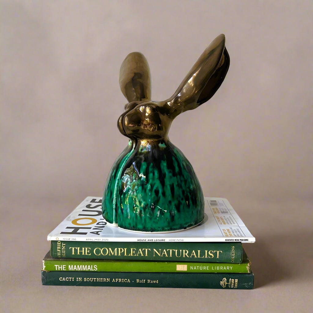 rialheim bookends in the shape of a bunny in green glaze and in ceramics