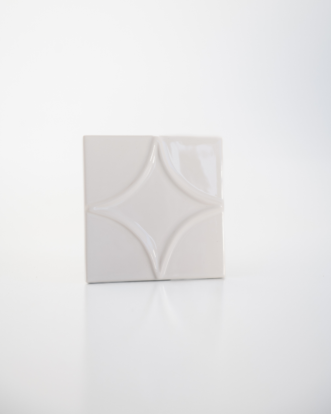 White decorative wall tile on a white background