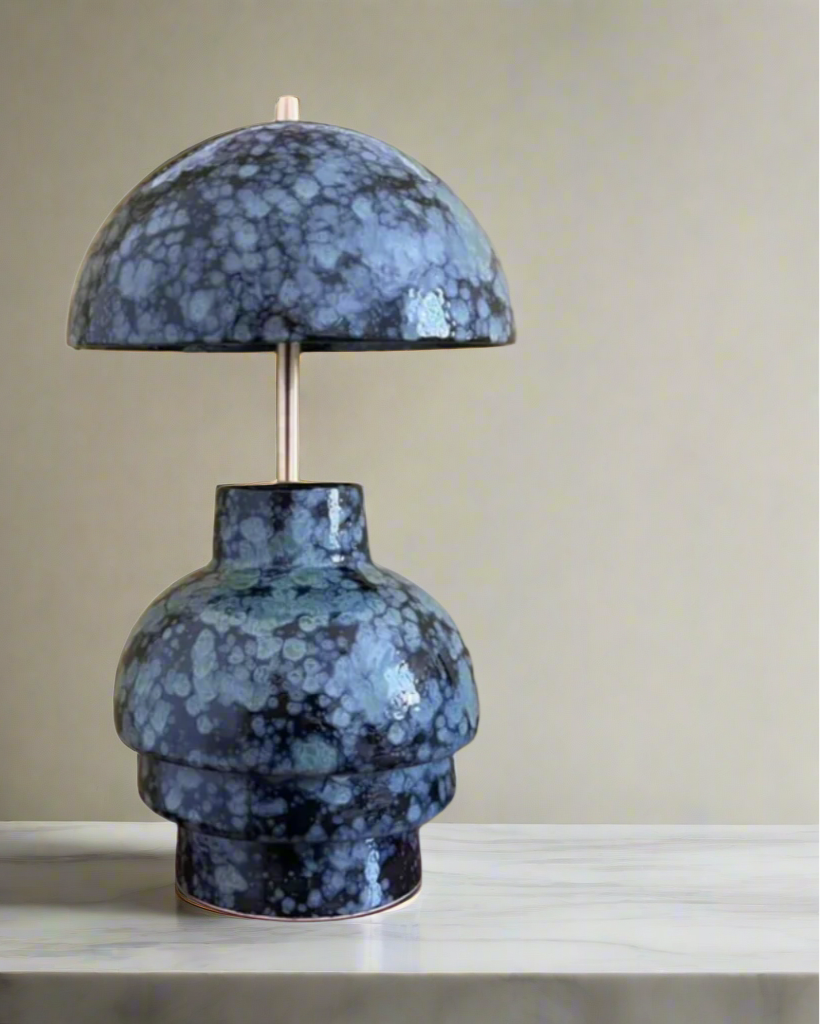 Blue marbled table lamp on a white background