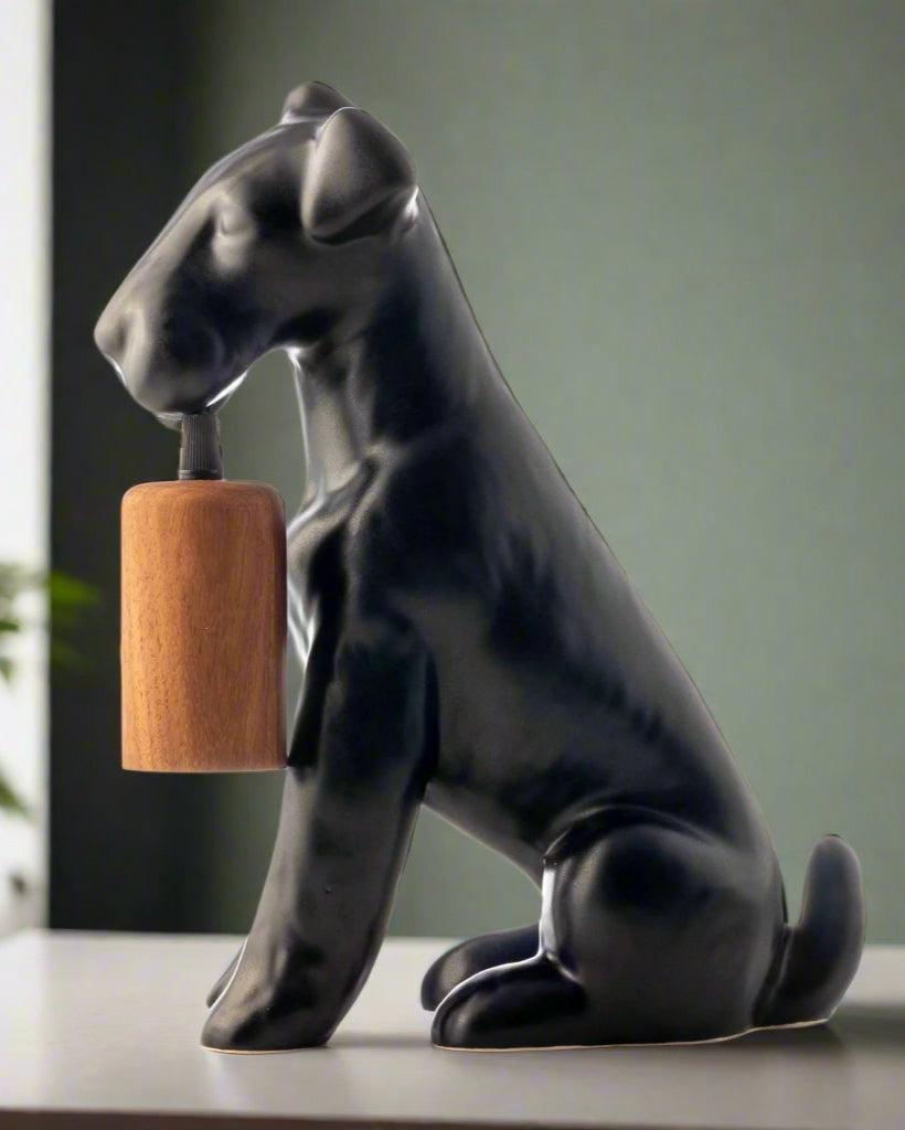 Rialheim_Ceramics_Gifts_Airedale Table Lamp_A table lamp shaped like an Airedale dog holding the bulb_MadeinSouthAfrica