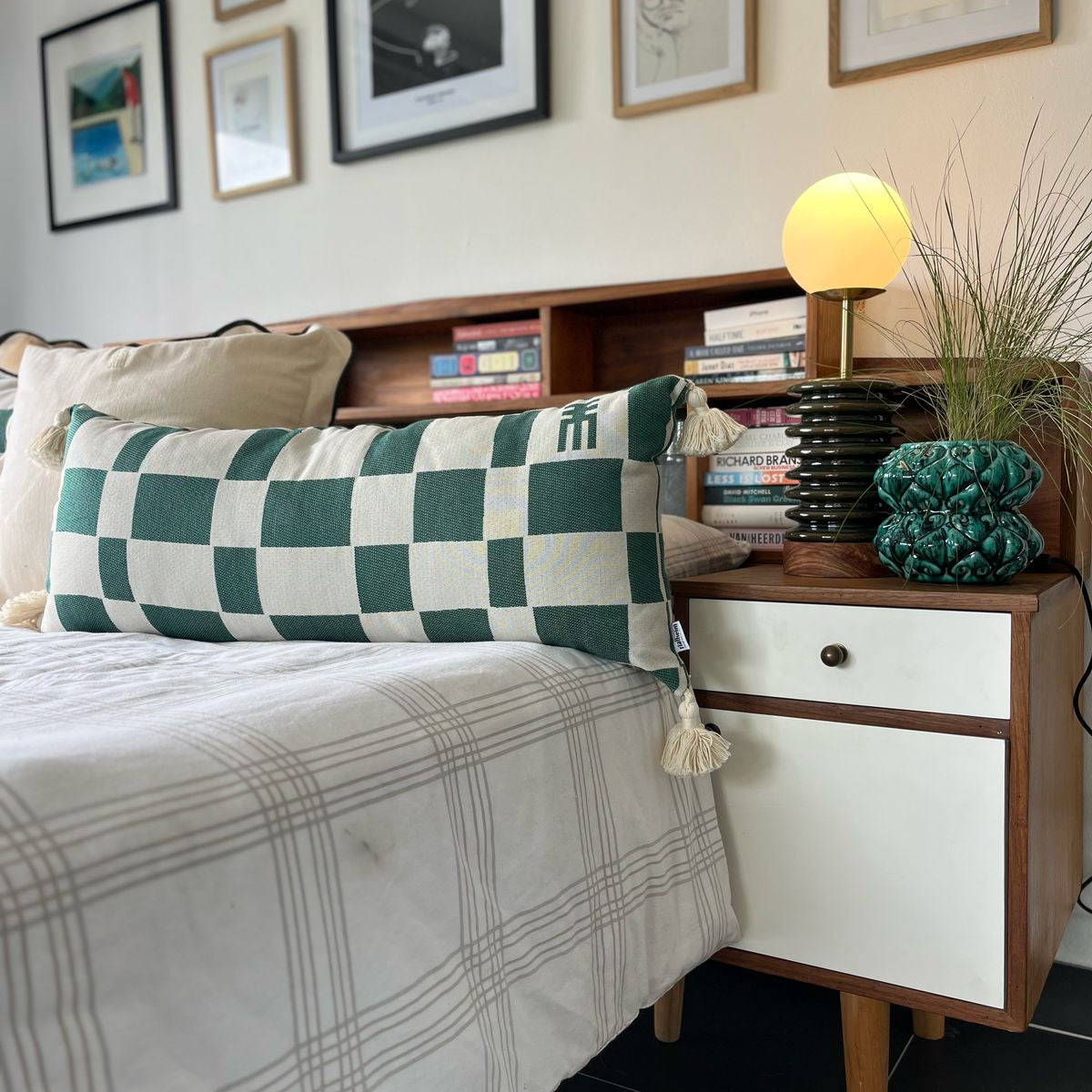 Checkmate scatter pillow oblong shaped with a check patern in green and it is oversized