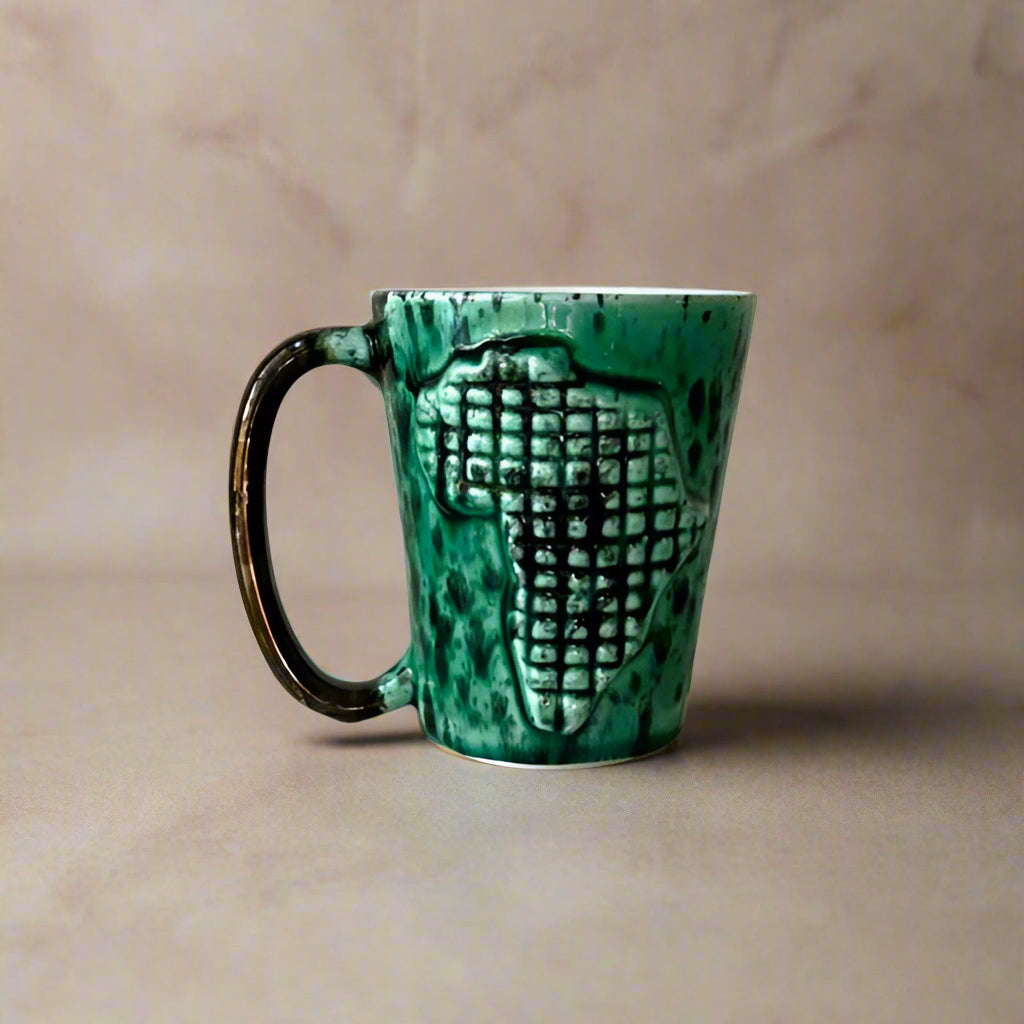 Rialheim Mug with African emblem in it in emerald glaze