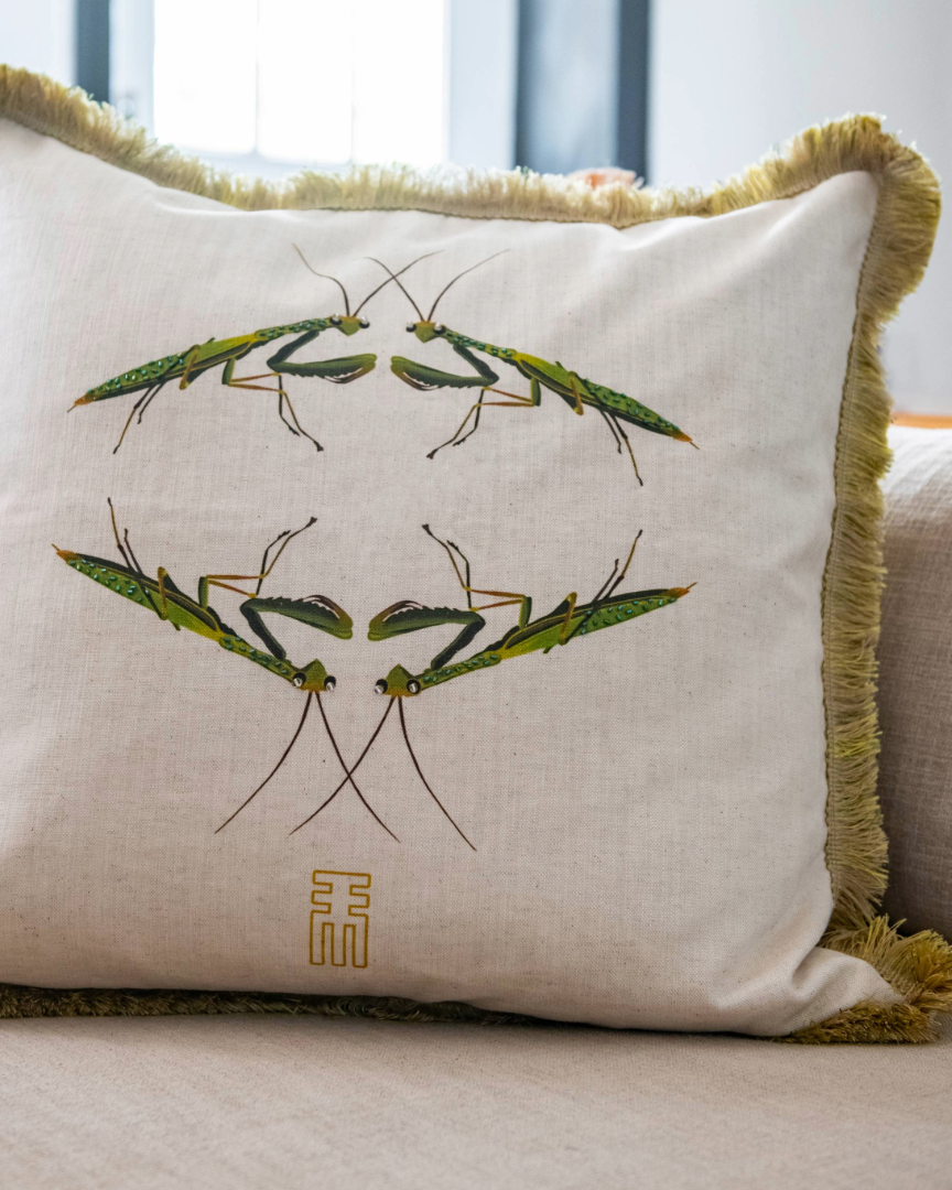 Rialheim scatter cushion with pray mantis on the front