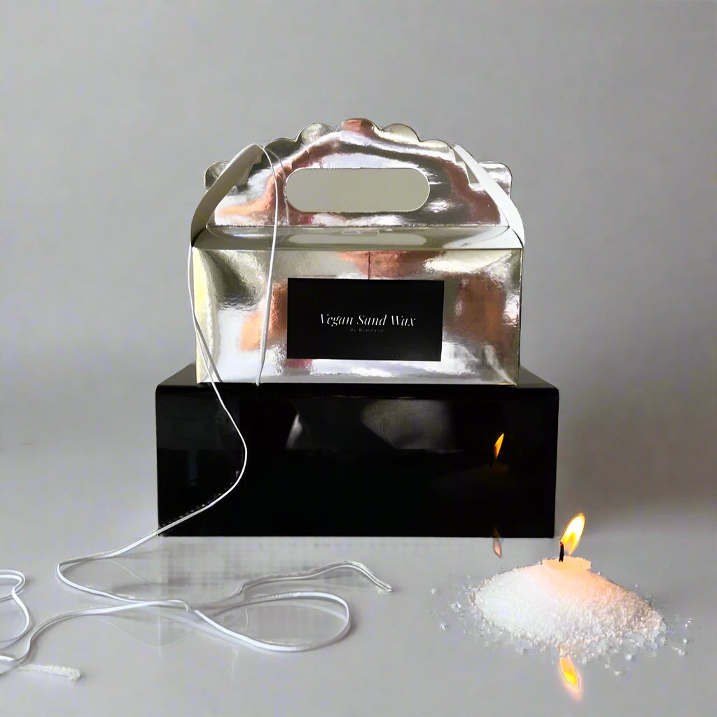Rialheim Sand wax packaged in a chrome silver giftbox with your wax and wicks in the giftbox