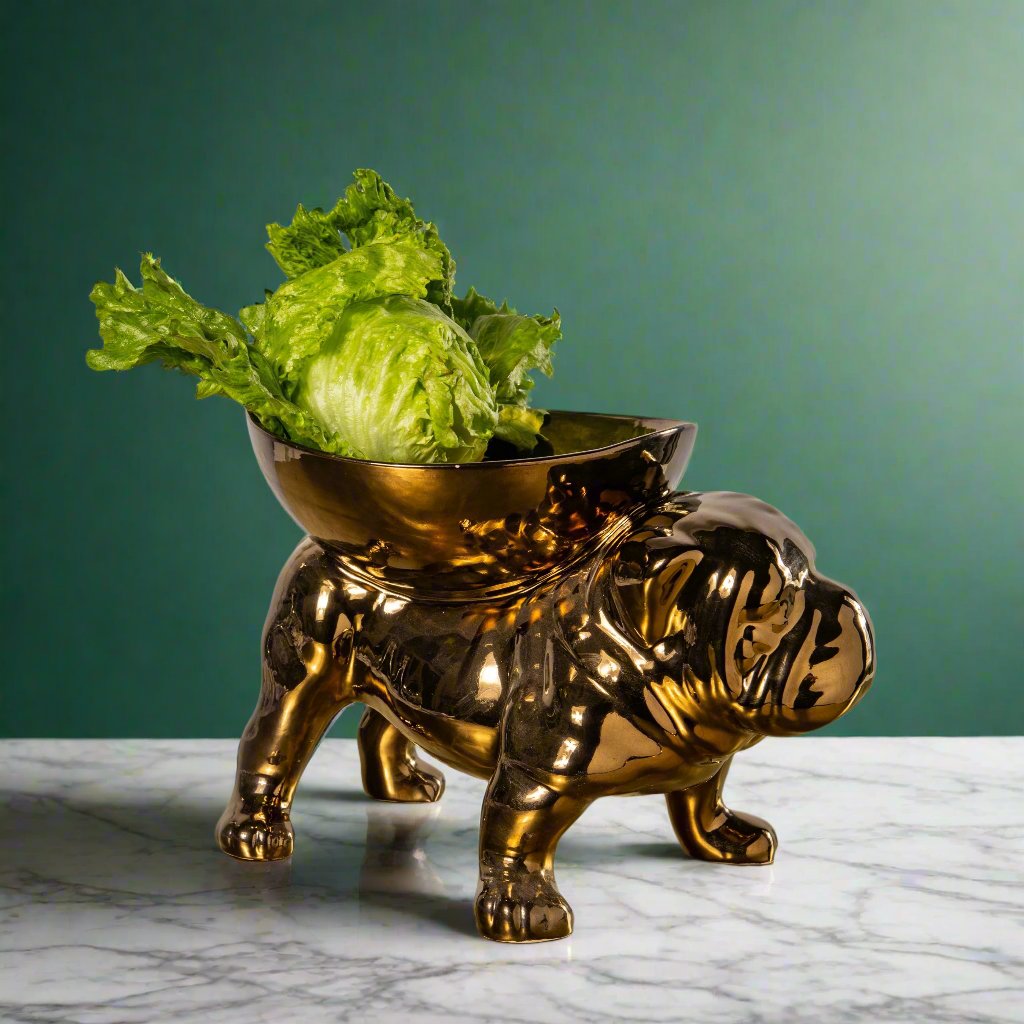 BRUTUS BULLDOG BOWL EXTRA LARGE - Rialheim  An extra large fruit bowl in the shape of a bulldog, with a wrinkled face, pushed-in nose, and a golden-brown finish